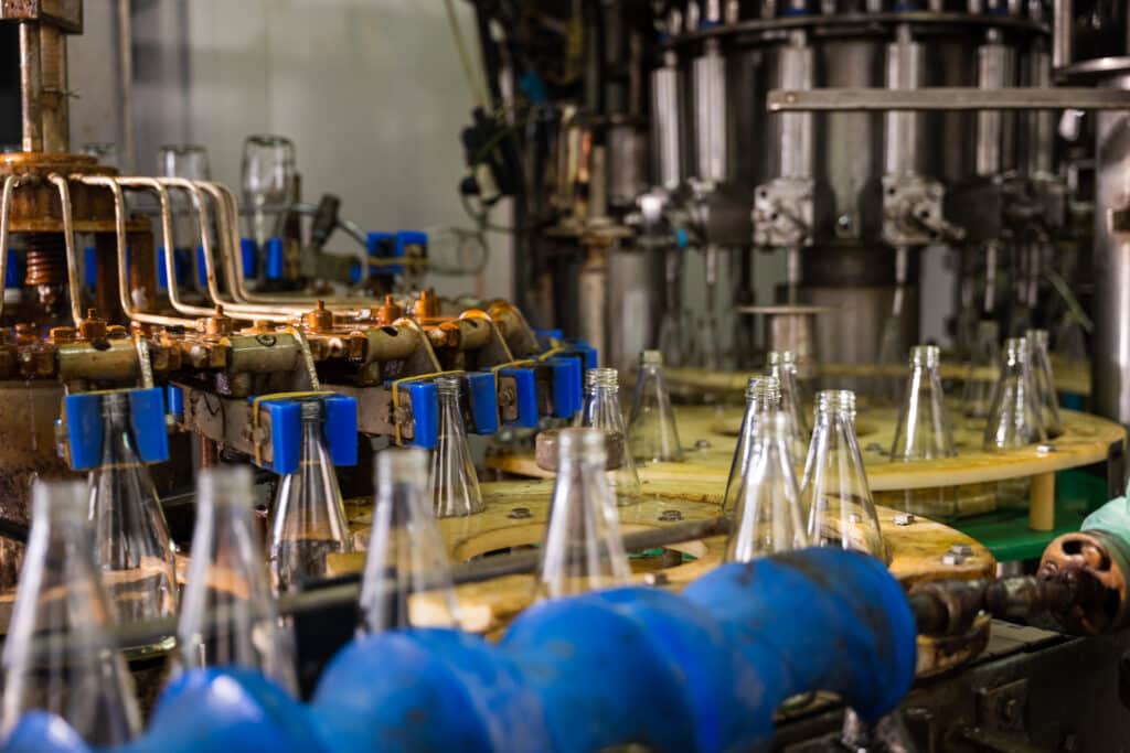 AXTRA media asset associated with glass bottle filling and capping machine and filling, rinsing and liquid bottling systems.