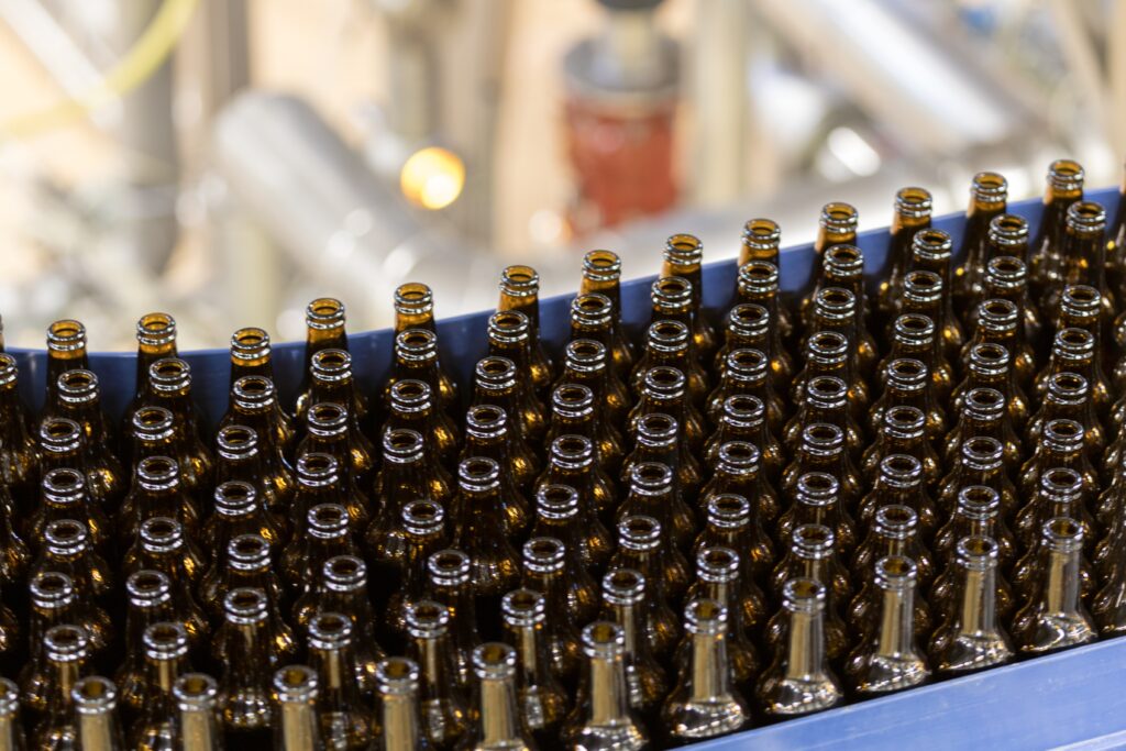 AXTRA media asset associated with gravity bottle filling machine and filling, rinsing and liquid bottling systems.