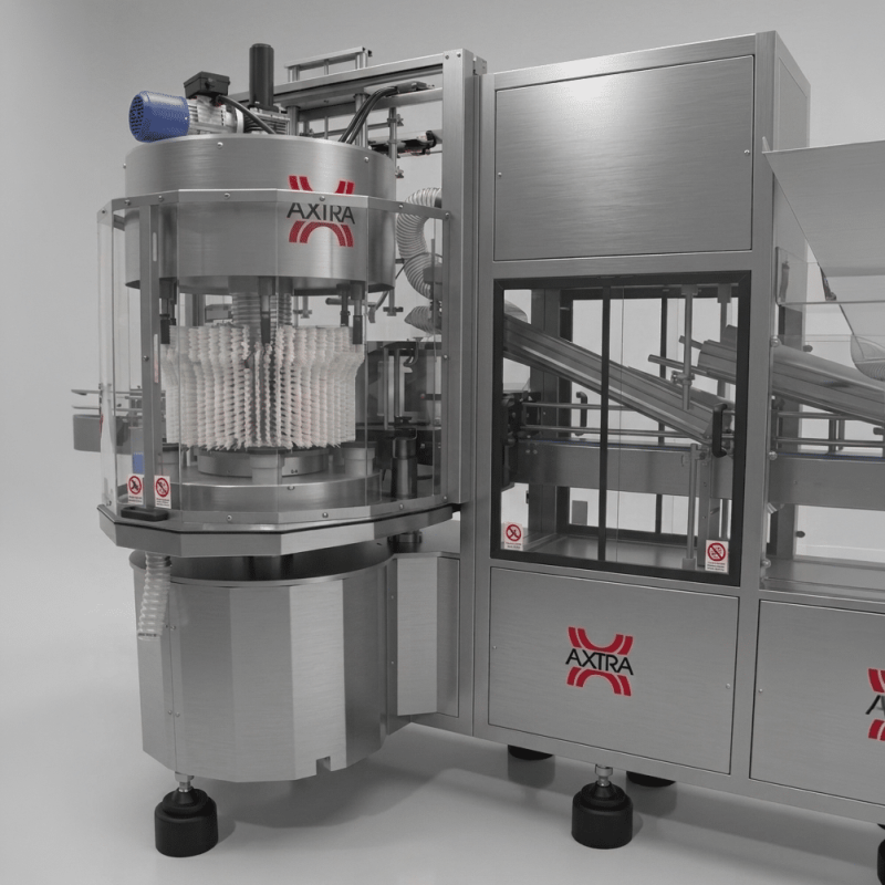 AXTRA rotary external bottle washing and drying unit connected to the adjacent filling and packaging line cabinet