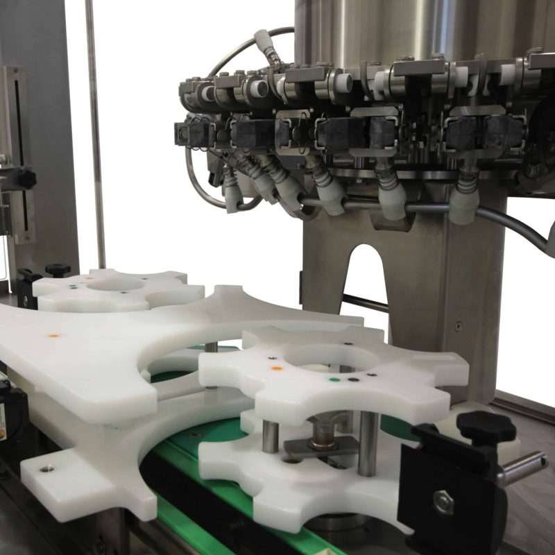 AXTRA media asset associated with bottle capping and bottle capping, closure and cap handling systems.