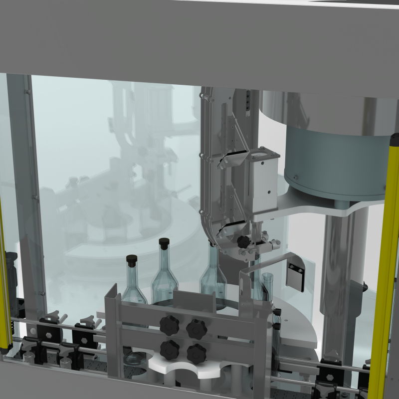 Close-up view inside the AXTRA pressure-seal T caps machine showing the pick-and-place gripper positioned above glass bottles