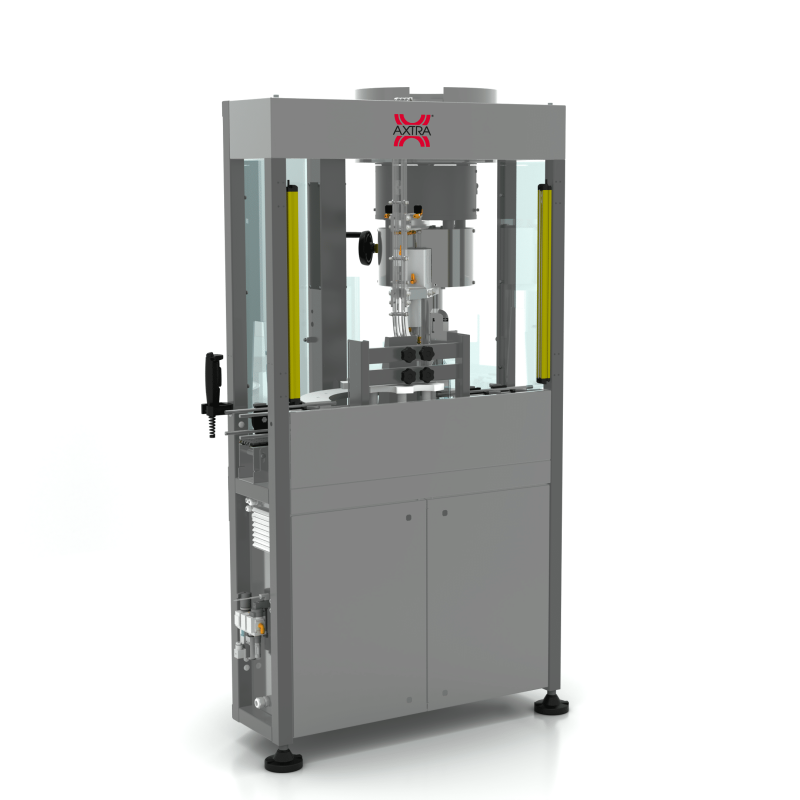 Front three-quarter view of the AXTRA crown cap machine showing the crimping head above a grid of bottles