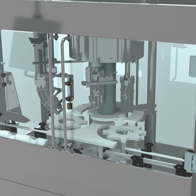 Close-up view inside the AXTRA aluminium screw cap machine showing the rotary star-wheel transfer and ROPP capping heads